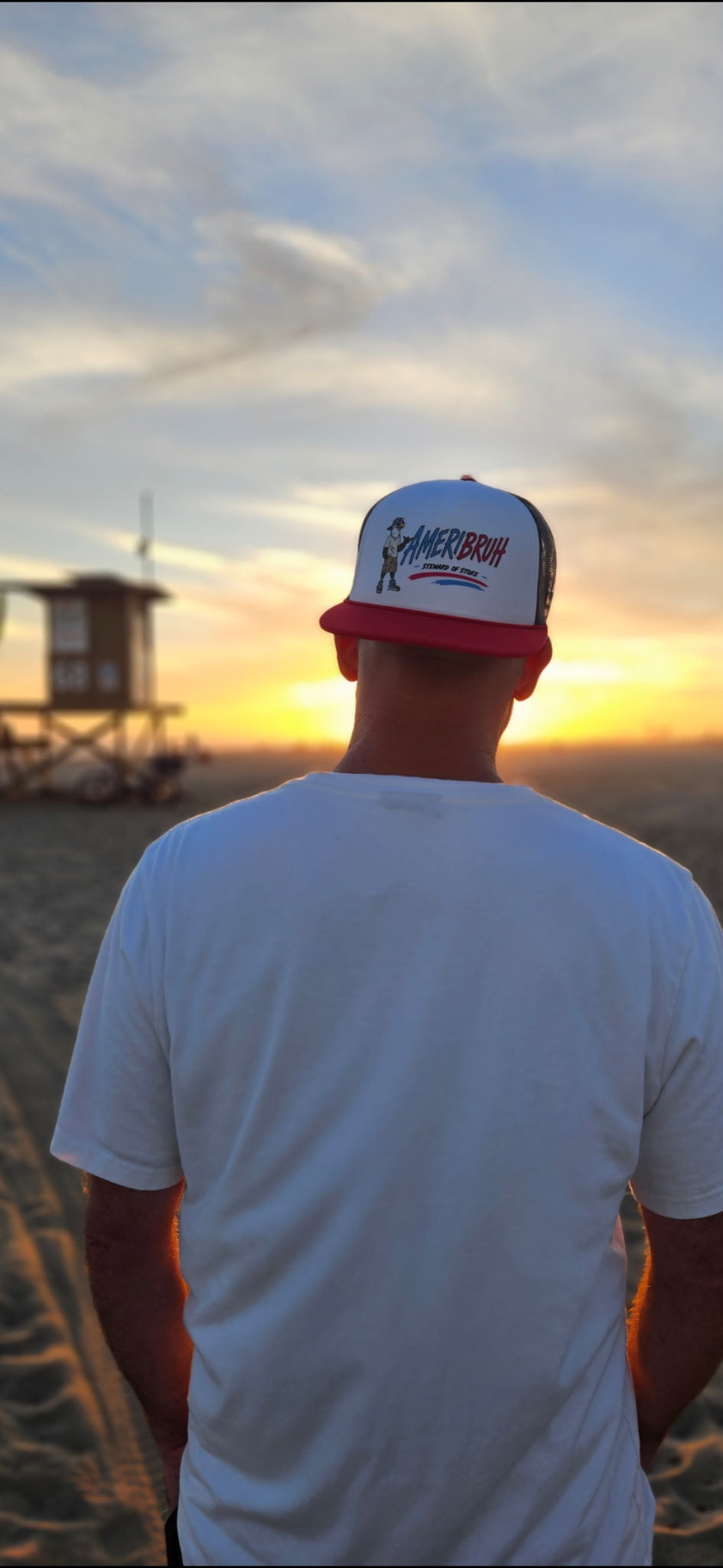 Ameribruh red brim trucker hat flat lay